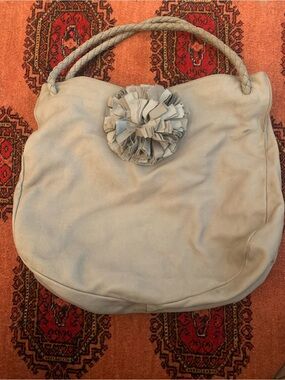 Augustina nubuck suede tote in a taupe with a rosette